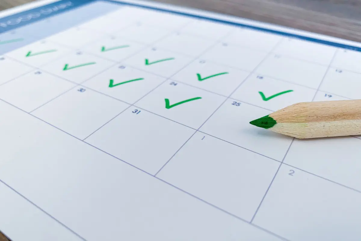 Calendar checkmarks tracking completed tests under dot follow up drug testing procedures